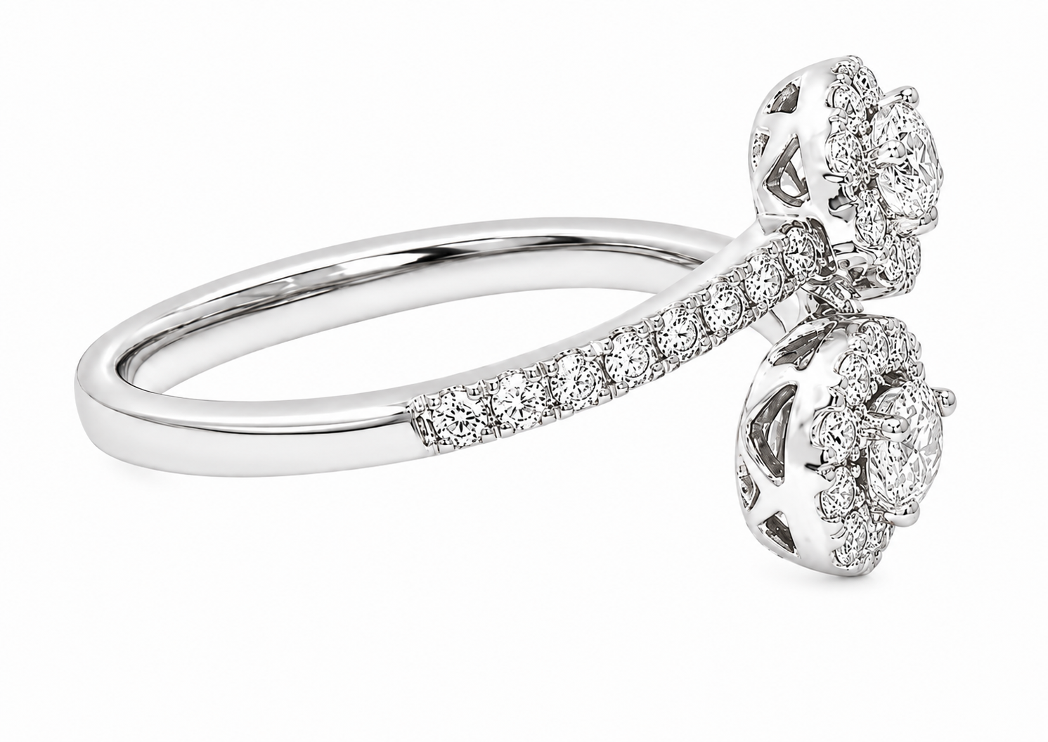 GBC, Inc. 18K White Gold Bypass Diamond Ring with two diamond clusters and accent stones along the band.