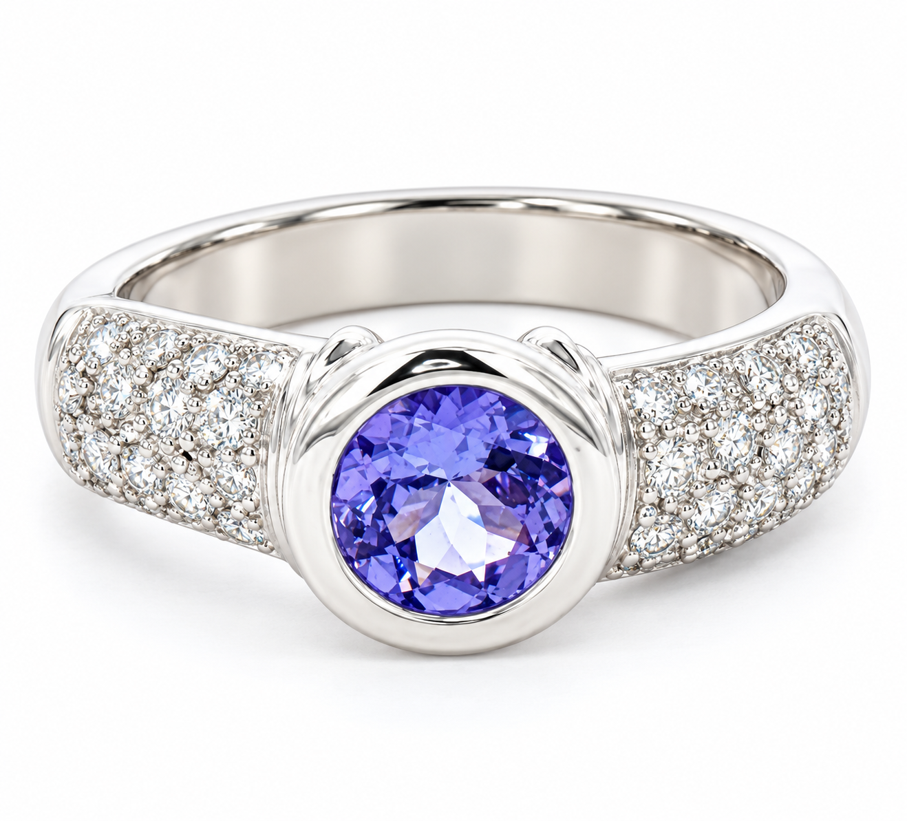 A white gold ring featuring a round purple tanzanite center stone, with pavé-set clear stones along the shoulders, shown on a plain white background.