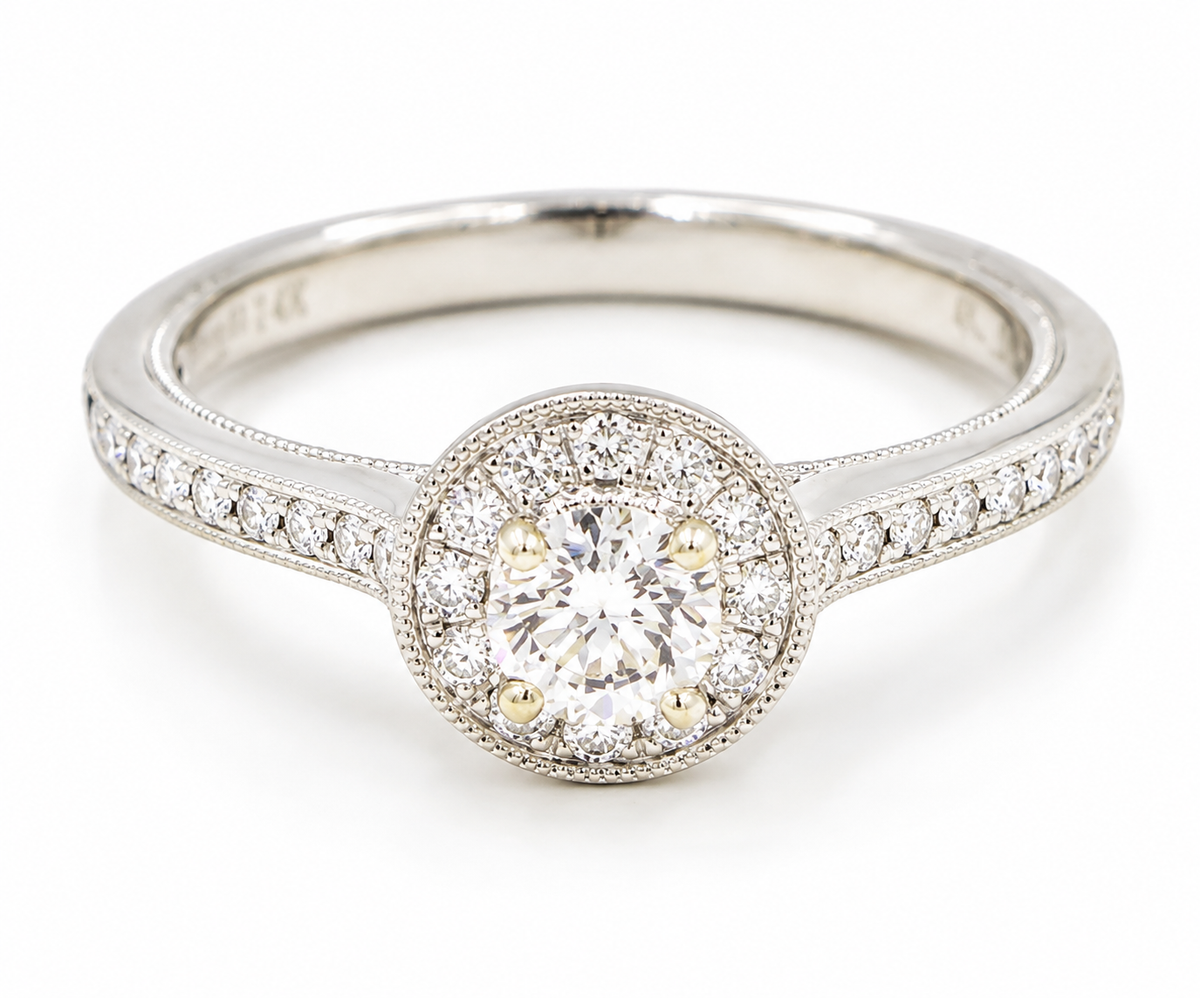 Estate 14k White Gold Designer Venetti Diamond Halo ring with a round center stone and pavé accents on the band.