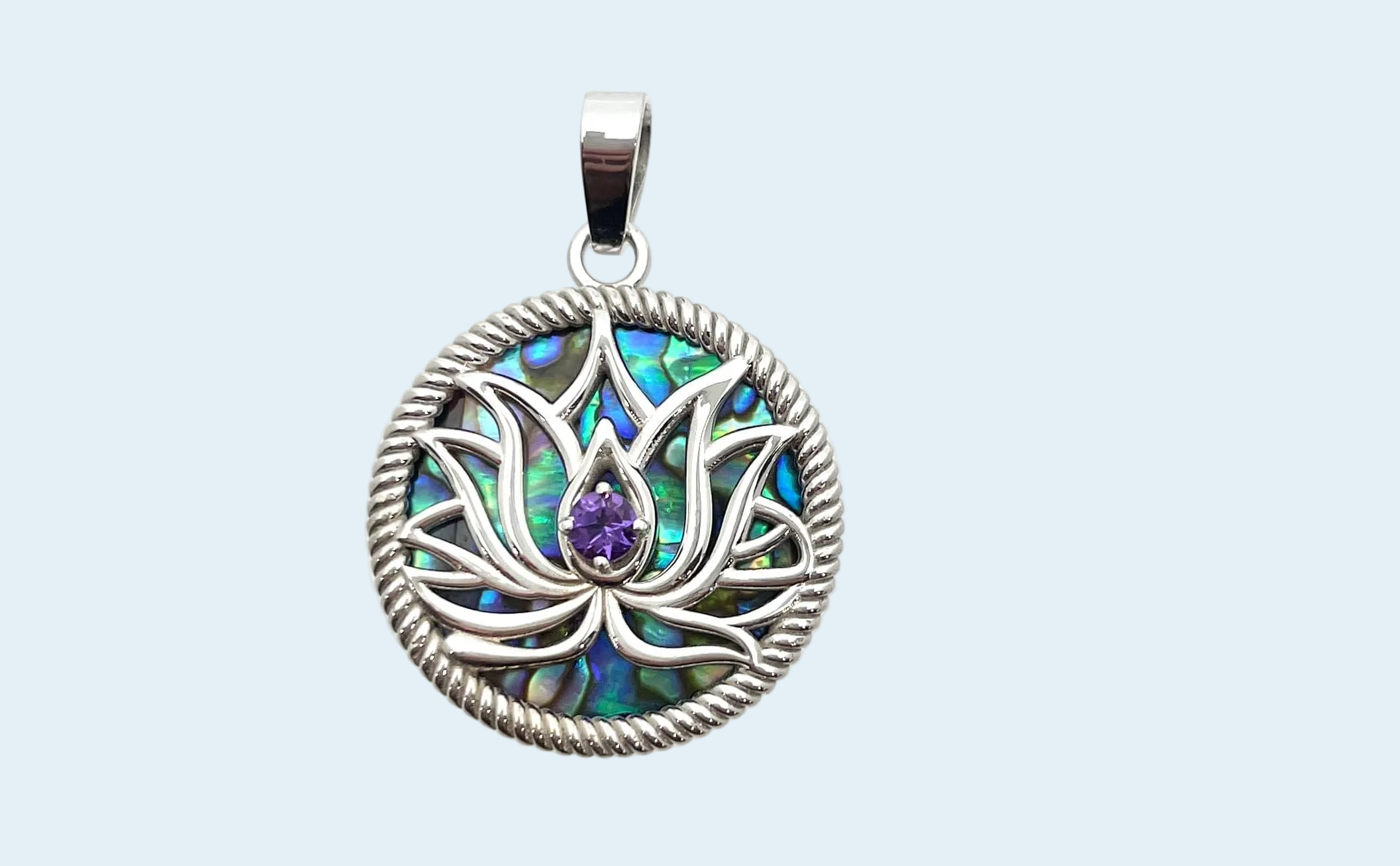 Silver, circular pendant with a silver octopus design and purple gemstone with green and blue background accents.