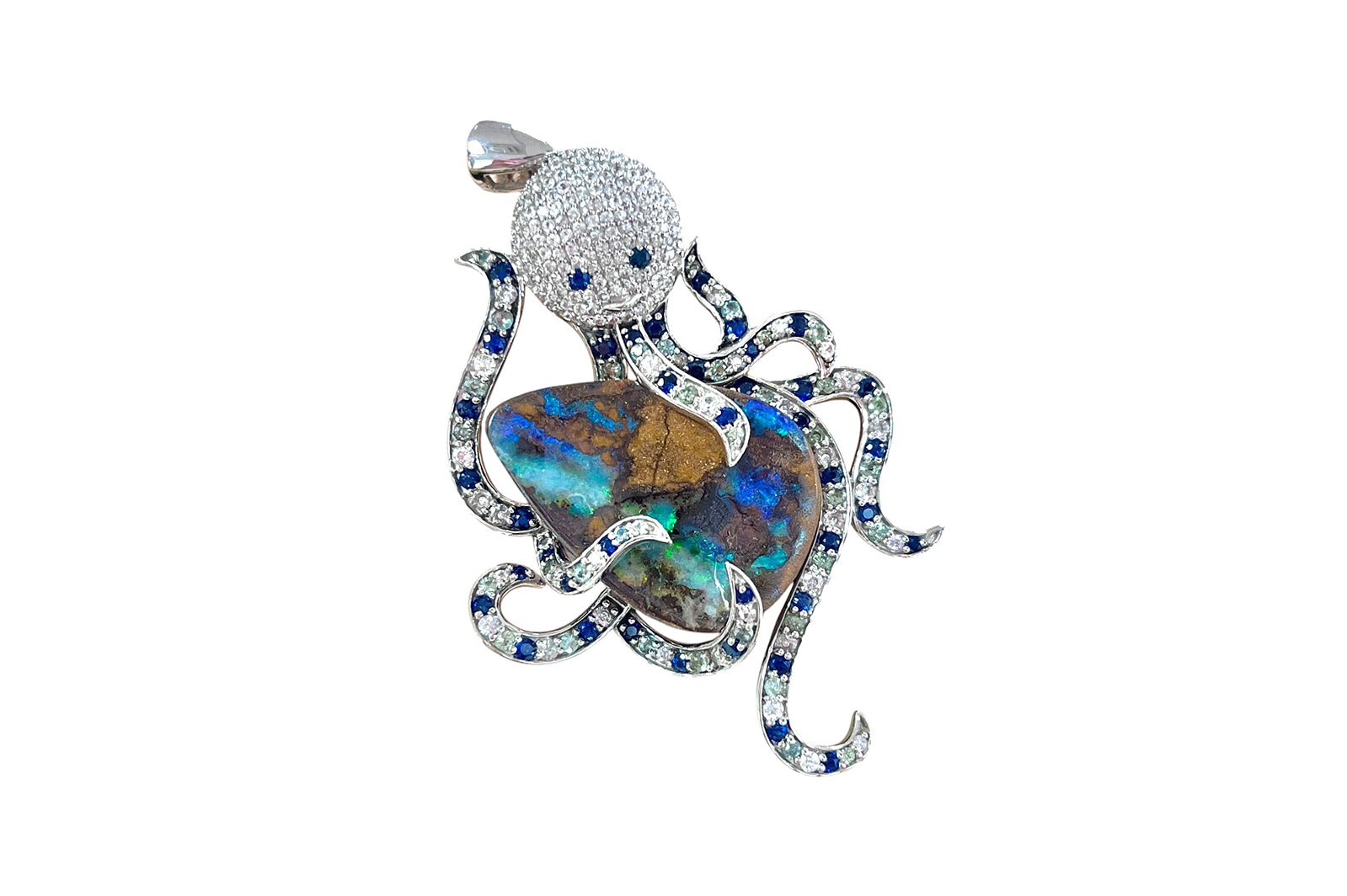 Jewelry pendant shaped like an octopus holding a gemstone on a white background